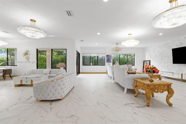 13005 Addilyn Ct, Davie, FL 33325 - living area with recessed lighting, a chandelier, and marble finish floors