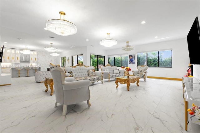 13005 Addilyn Ct, Davie, FL 33325 - living area with a chandelier, marble finish floors, and recessed lighting