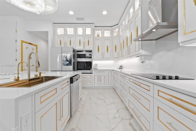 13005 Addilyn Ct, Davie, FL 33325 - kitchen with wall chimney exhaust hood, appliances with stainless steel finishes, light marble finish floors, white cabinetry, and light countertops