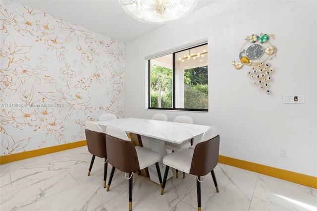 13005 Addilyn Ct, Davie, FL 33325 - dining space with light marble finish floors, a chandelier, and wallpapered walls