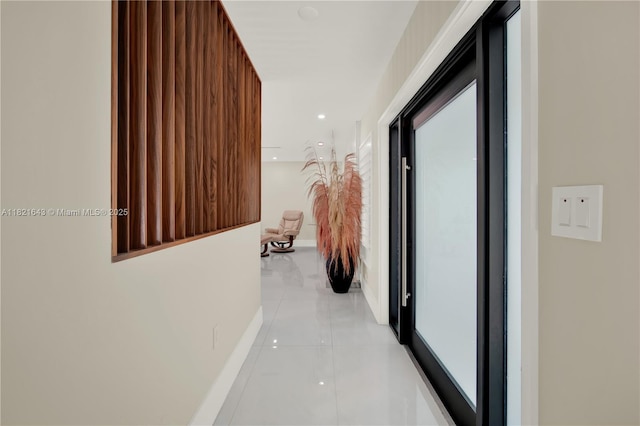 14625 SW 83rd Pl, Palmetto Bay, FL 33158 - corridor featuring light tile patterned floors and baseboards