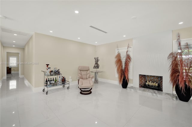 14625 SW 83rd Pl, Palmetto Bay, FL 33158 - sitting room featuring tile patterned floors, recessed lighting, and a fireplace