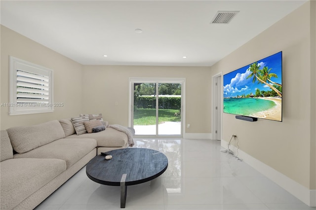 14625 SW 83rd Pl, Palmetto Bay, FL 33158 - living room featuring light tile patterned flooring and recessed lighting