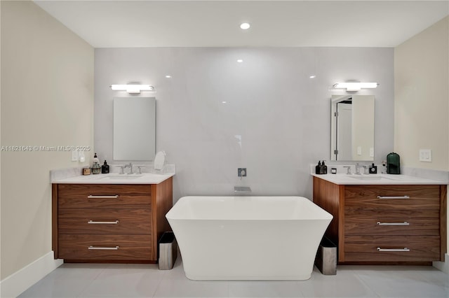 14625 SW 83rd Pl, Palmetto Bay, FL 33158 - full bath featuring a freestanding tub, two vanities, and tile patterned flooring