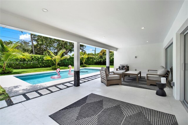 14625 SW 83rd Pl, Palmetto Bay, FL 33158 - view of swimming pool with outdoor lounge area and a patio