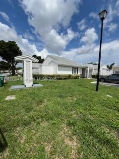 13766 SW 147th Cir Ln Unit 1-20, Miami, FL 33186 - view of grassy yard
