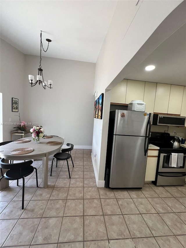 13766 SW 147th Cir Ln Unit 1-20, Miami, FL 33186 - dining room with light tile patterned floors and a chandelier