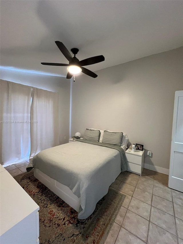 13766 SW 147th Cir Ln Unit 1-20, Miami, FL 33186 - bedroom with light tile patterned flooring and a ceiling fan