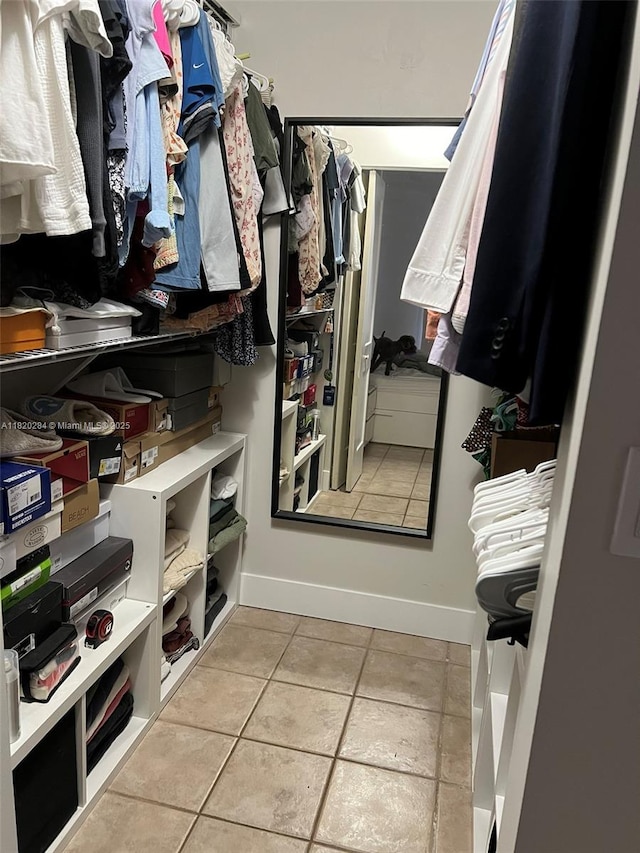 13766 SW 147th Cir Ln Unit 1-20, Miami, FL 33186 - walk in closet with light tile patterned flooring