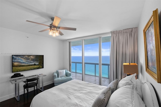 6899 Collins Ave Unit 2707, Miami Beach, FL 33141 - bedroom featuring access to outside, a water view, dark wood finished floors, and ceiling fan