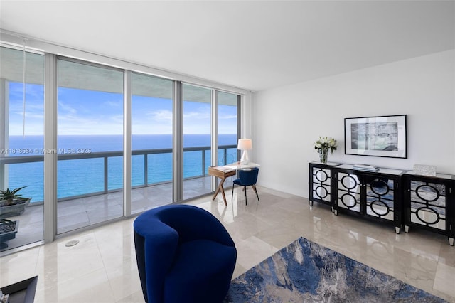 6899 Collins Ave Unit 2707, Miami Beach, FL 33141 - living room featuring expansive windows and a water view