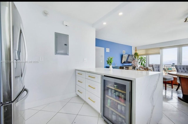 1920 S Ocean Dr Unit 901, Fort Lauderdale, FL 33316 - kitchen with beverage cooler, stainless steel fridge, electric panel, light countertops, and modern cabinets