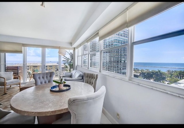 1920 S Ocean Dr Unit 901, Fort Lauderdale, FL 33316 - dining room with lofted ceiling and a water view