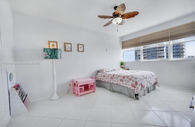 1920 S Ocean Dr Unit 901, Fort Lauderdale, FL 33316 - tiled bedroom featuring multiple windows and a ceiling fan