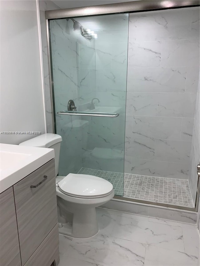 1800 Sans Souci Blvd Unit 201, North Miami, FL 33181 - full bathroom with vanity, a marble finish shower, and marble look tile flooring