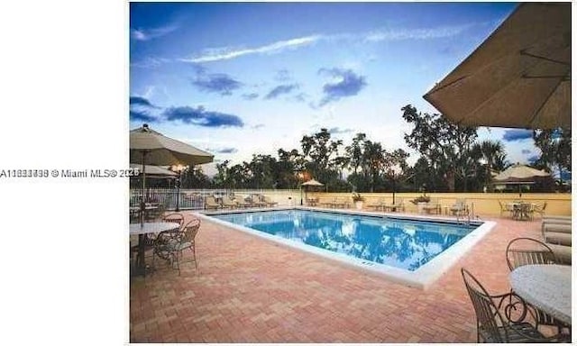 1800 Sans Souci Blvd Unit 201, North Miami, FL 33181 - community pool with a patio