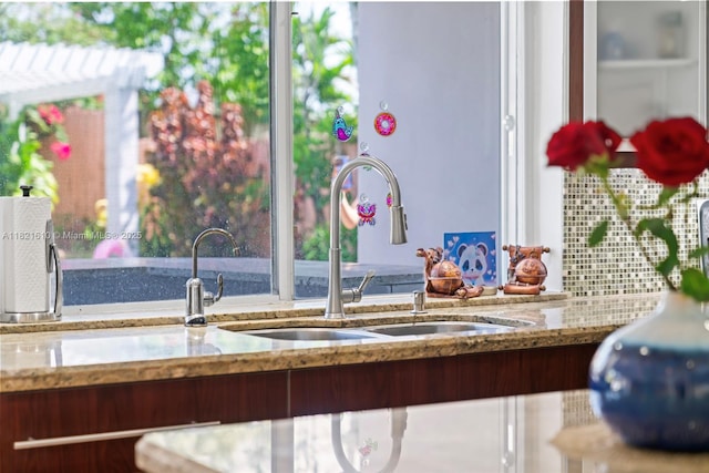 930 NE 182nd Ter, North Miami Beach, FL 33162 - detailed view of light stone countertops and decorative backsplash