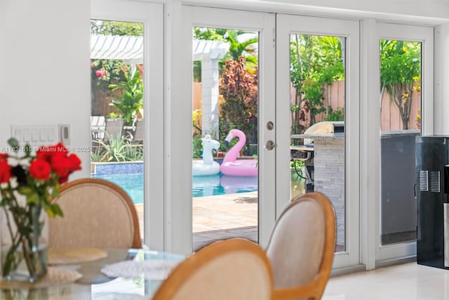 930 NE 182nd Ter, North Miami Beach, FL 33162 - dining area featuring healthy amount of natural light and french doors