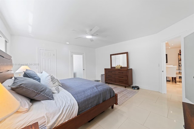 930 NE 182nd Ter, North Miami Beach, FL 33162 - bedroom with light tile patterned floors, ceiling fan, and a closet