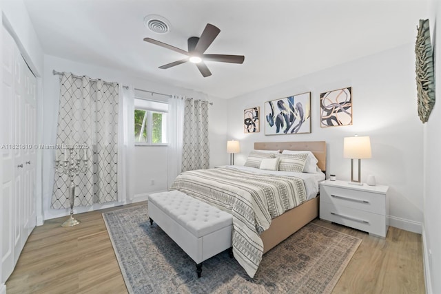 930 NE 182nd Ter, North Miami Beach, FL 33162 - bedroom with light wood-style flooring, a ceiling fan, and a closet