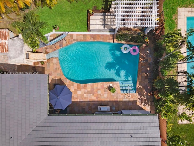 930 NE 182nd Ter, North Miami Beach, FL 33162 - drone / aerial view of a pool area