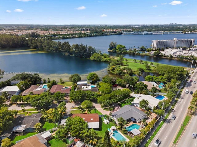 930 NE 182nd Ter, North Miami Beach, FL 33162 - bird's eye view of a nearby body of water and a pool area