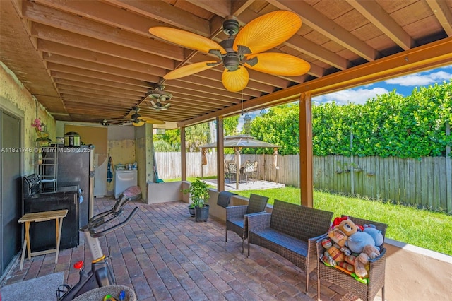 7100 Mcclellan St, Hollywood, FL 33024 - fenced backyard featuring a ceiling fan, a patio, and a wooden deck