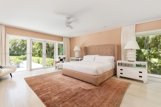 11100 Paradela St, Coral Gables, FL 33156 - bedroom featuring access to outside, light wood finished floors, french doors, and a ceiling fan