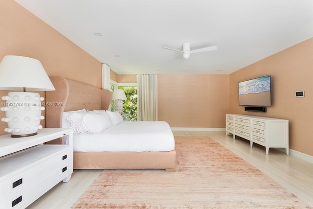 11100 Paradela St, Coral Gables, FL 33156 - bedroom with light wood finished floors and ceiling fan