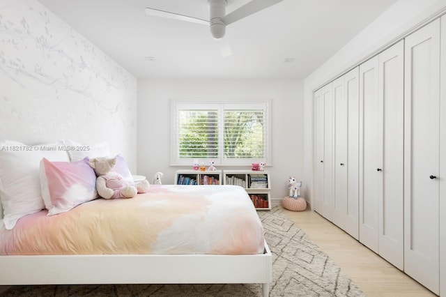 11100 Paradela St, Coral Gables, FL 33156 - bedroom with light wood-style floors, a closet, and ceiling fan