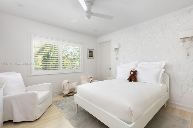 11100 Paradela St, Coral Gables, FL 33156 - bedroom with light wood-type flooring and a ceiling fan