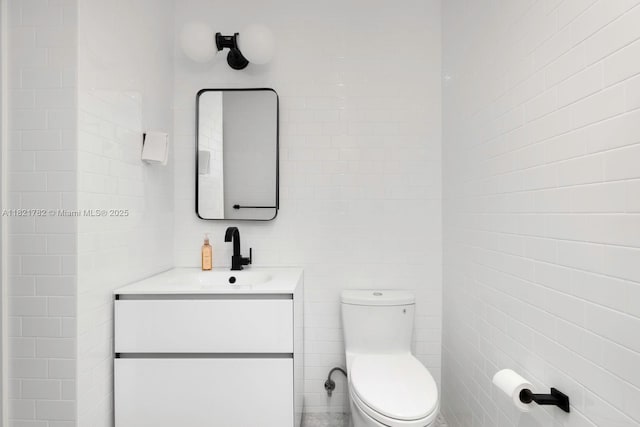 11100 Paradela St, Coral Gables, FL 33156 - bathroom featuring vanity and tile walls