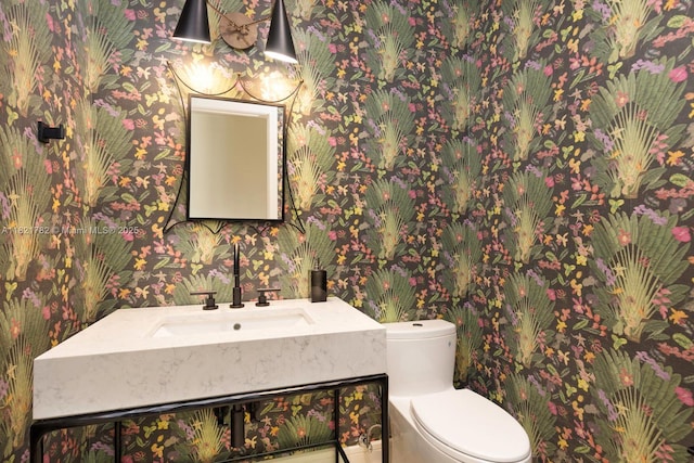 11100 Paradela St, Coral Gables, FL 33156 - half bathroom featuring wallpapered walls and vanity