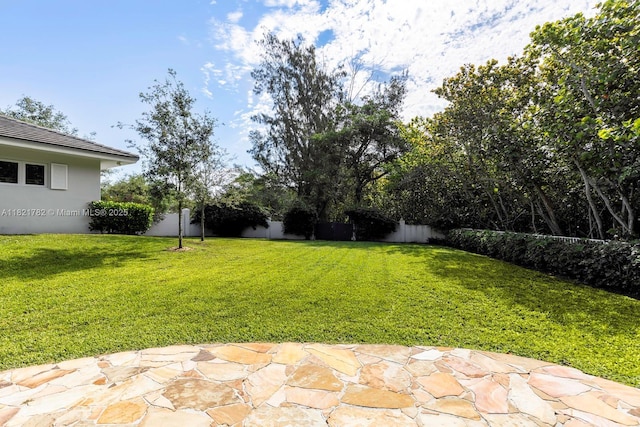 11100 Paradela St, Coral Gables, FL 33156 - fenced backyard featuring a patio area