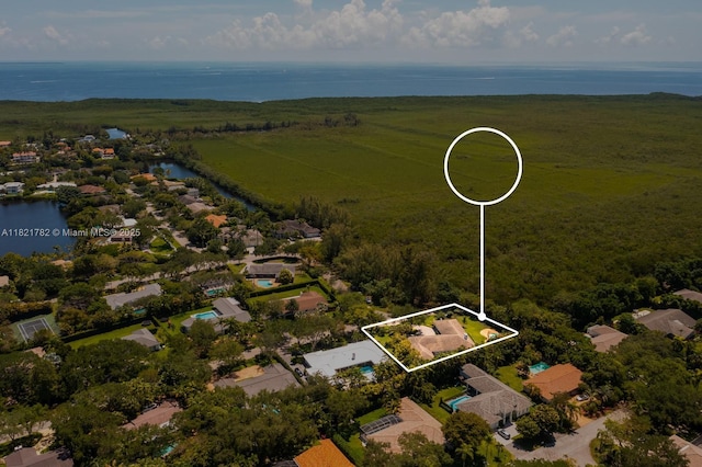 11100 Paradela St, Coral Gables, FL 33156 - aerial view of residential area featuring a nearby body of water and property boundaries highlighted