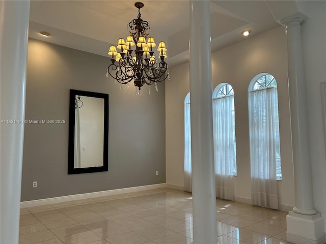 2640 Fairways Dr, Homestead, FL 33035 - spare room featuring light tile patterned floors, ornate columns, a chandelier, and recessed lighting