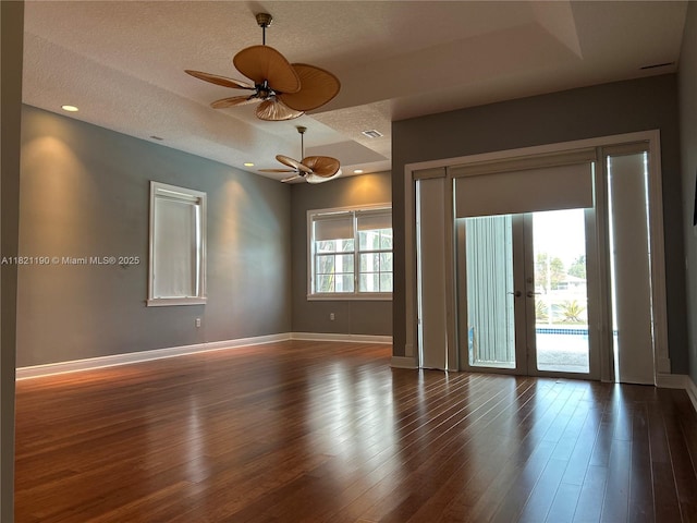 2640 Fairways Dr, Homestead, FL 33035 - spare room with ceiling fan, a textured ceiling, wood finished floors, and french doors