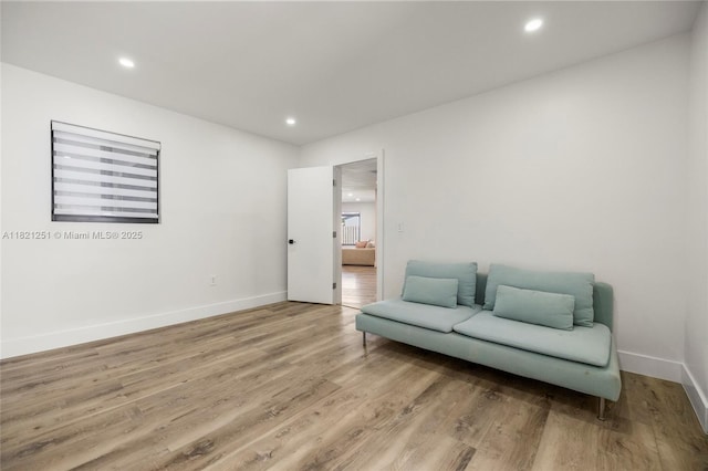 3910 NE 27th Ter, Lighthouse Point, FL 33064 - living area with light wood finished floors and recessed lighting