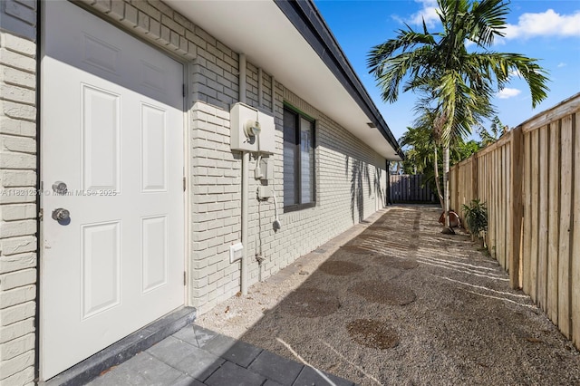 3910 NE 27th Ter, Lighthouse Point, FL 33064 - view of side of home with brick siding