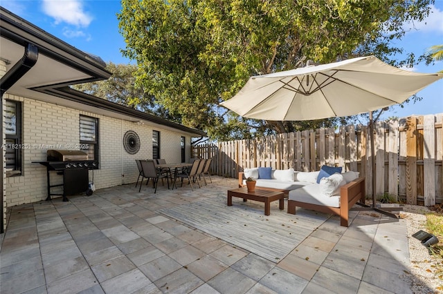 3910 NE 27th Ter, Lighthouse Point, FL 33064 - view of patio with outdoor dining area, outdoor lounge area, and grilling area