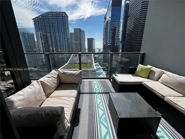 88 SW 7th St Unit 2209, Miami, FL 33130 - balcony featuring an outdoor living space and a view of skyline