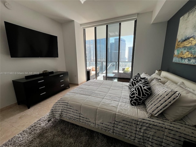 88 SW 7th St Unit 2209, Miami, FL 33130 - bedroom featuring access to outside, a wall of windows, and a city view