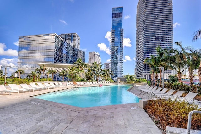 88 SW 7th St Unit 2209, Miami, FL 33130 - community pool with a city view and a patio