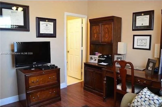 2402 NE 41st Pl, Homestead, FL 33033 - office space with dark wood-type flooring and baseboards