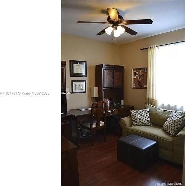 2402 NE 41st Pl, Homestead, FL 33033 - living room with dark wood-type flooring and ceiling fan