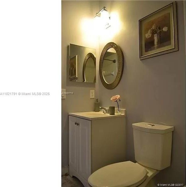 2402 NE 41st Pl, Homestead, FL 33033 - half bath featuring vanity and toilet