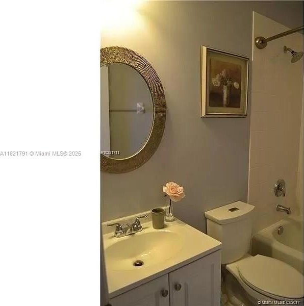 2402 NE 41st Pl, Homestead, FL 33033 - full bathroom with vanity and shower / bath combination