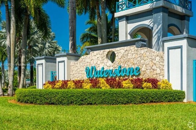 2402 NE 41st Pl, Homestead, FL 33033 - community sign with a lawn