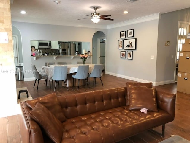 120 Hombre Cir Fl, Panama City Beach, FL 32407 - living area featuring arched walkways, ceiling fan, ornamental molding, wood finished floors, and recessed lighting