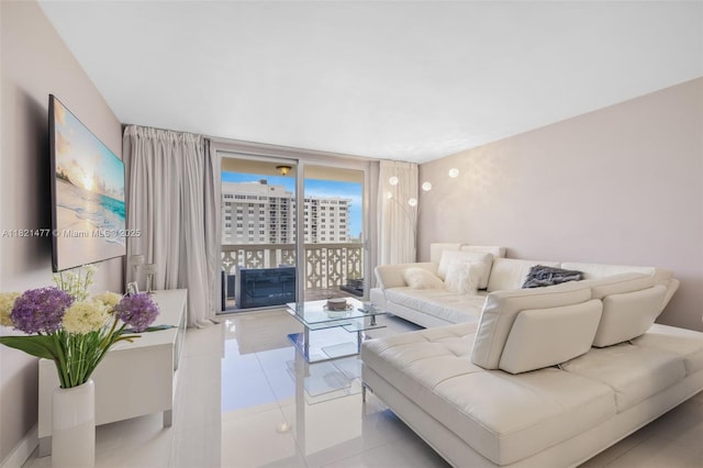 1825 S Ocean Dr Unit 1013, Hallandale Beach, FL 33009 - living room with floor to ceiling windows and light tile patterned flooring